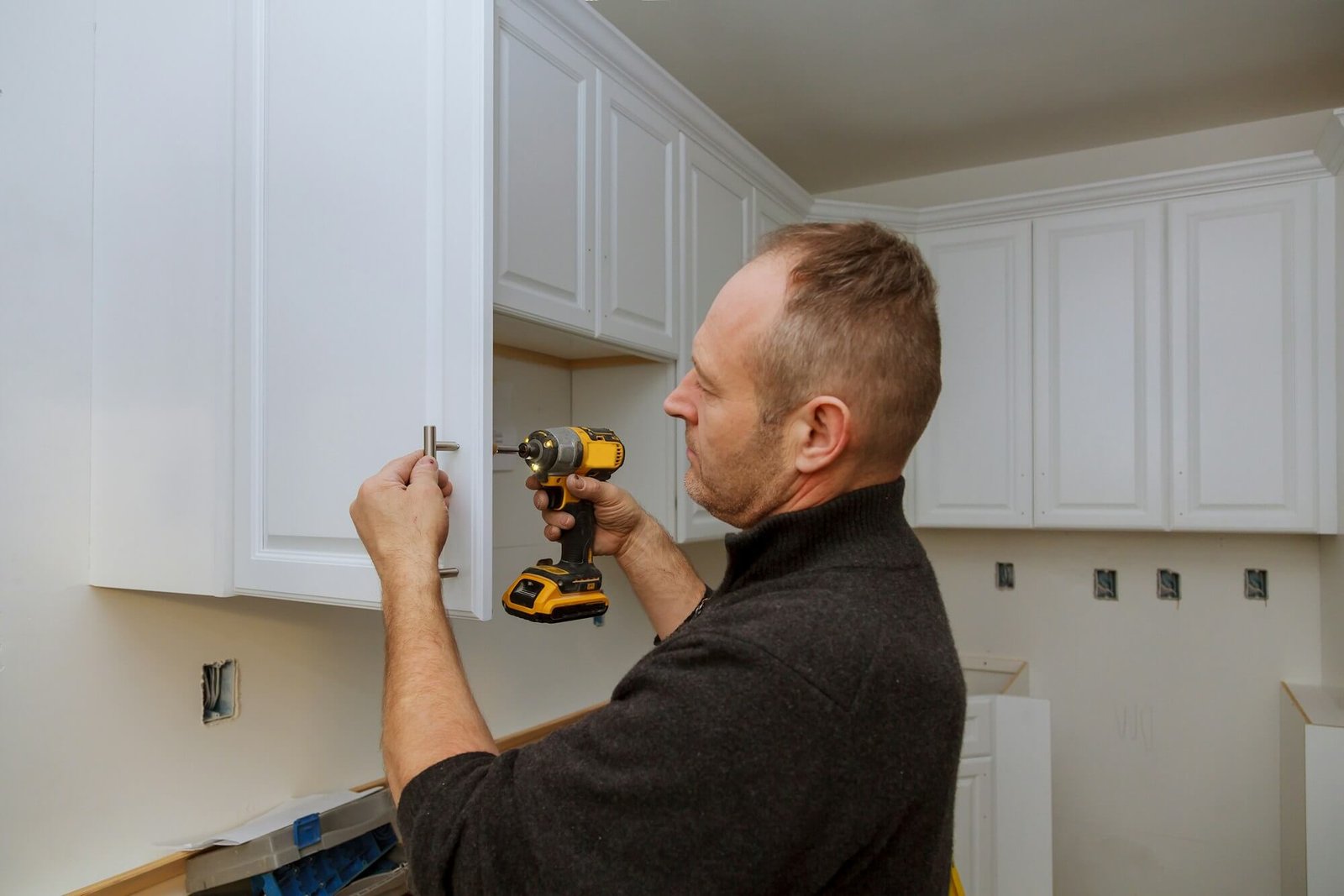 installation-of-furniture-hinges-the-cabinet-door.jpg